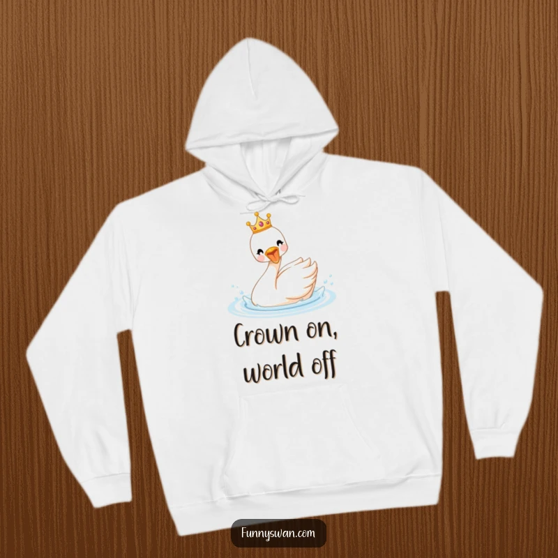 Funny royal swan hoodie with a tiny crown, showing a delighted bird splashing enthusiastically in water, warm and humorous.